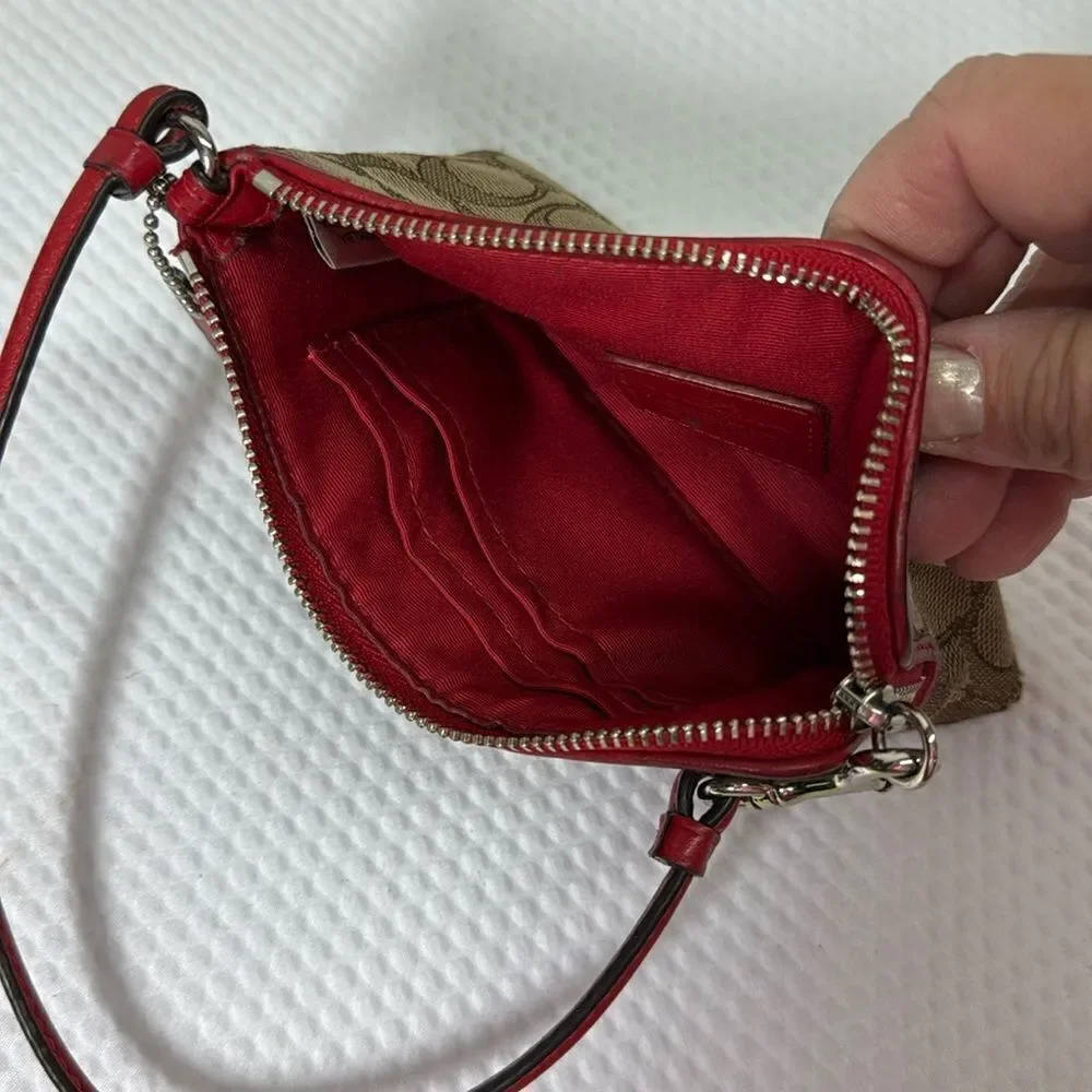 Coach tan and red Wristlet with Logo Pattern